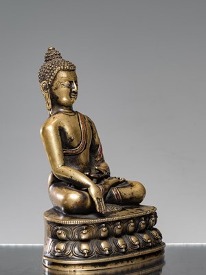 Lot 9 - A LARGE SILVER AND COPPER  INLAID BRONZE FIGURE OF SHAKYAMUNI BUDDHA, TIBET, 15TH CENTURY