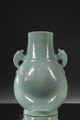 Lot 157 - LIGHT BLUE GLAZED DOVE-EAR VASE