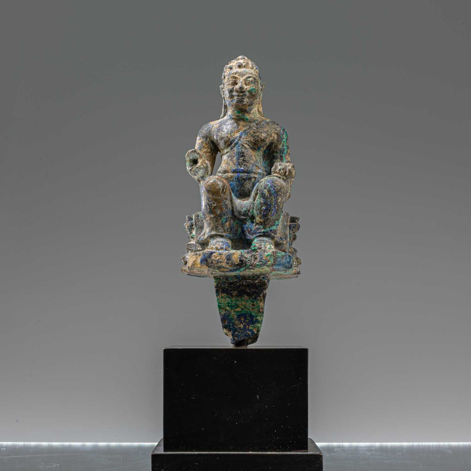 Lot 68 - SEATED MALACHITE BUDDHA , PRE-KHMER 7TH CENTURY