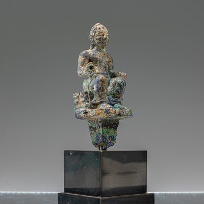 Lot 68 - SEATED MALACHITE BUDDHA , PRE-KHMER 7TH CENTURY