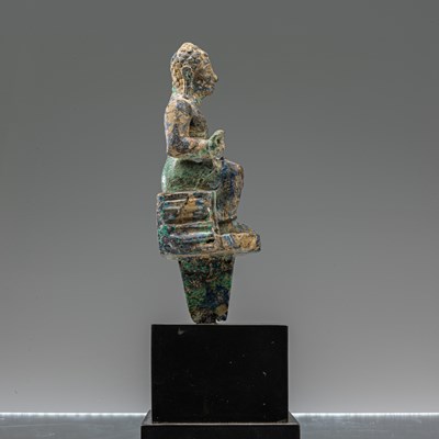 Lot 68 - SEATED MALACHITE BUDDHA , PRE-KHMER 7TH CENTURY
