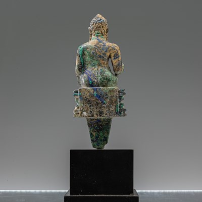 Lot 68 - SEATED MALACHITE BUDDHA , PRE-KHMER 7TH CENTURY