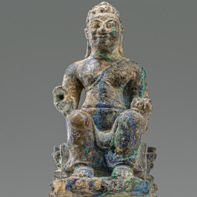 Lot 68 - SEATED MALACHITE BUDDHA , PRE-KHMER 7TH CENTURY