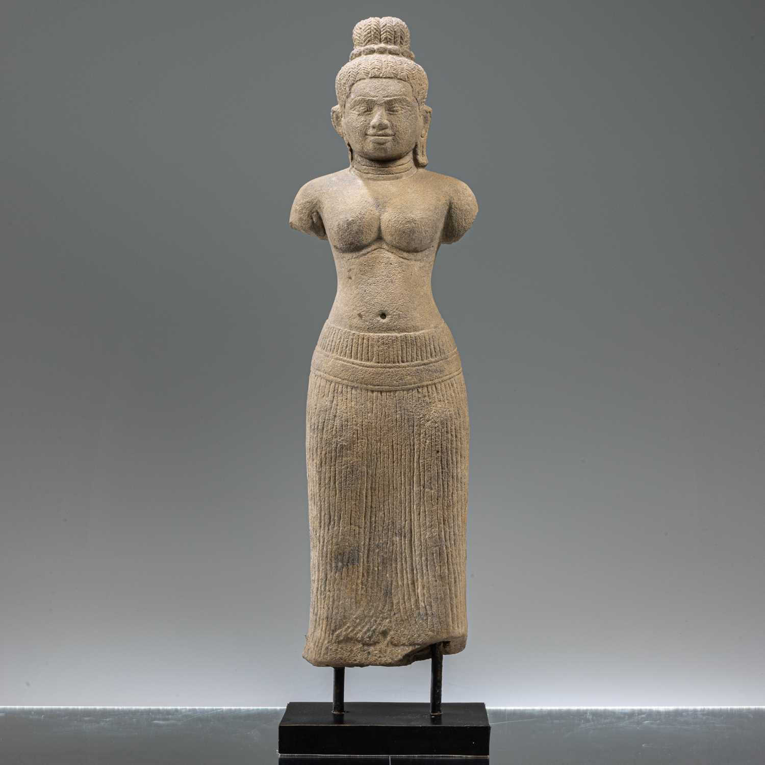 Lot 87 - STANDING SOUTH-EAST ASIAN SANDSTONE FIGURE OF UMA IN BAPHUOAN STYLE