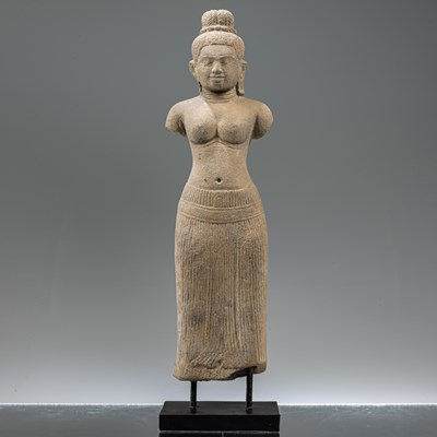 Lot 87 - STANDING SOUTH-EAST ASIAN SANDSTONE FIGURE OF UMA IN BAPHUOAN STYLE