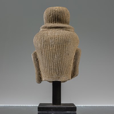 Lot 66 - SOUTH-EAST ASIAN SANDSTONE HEAD OF UMA 12TH CENTURY