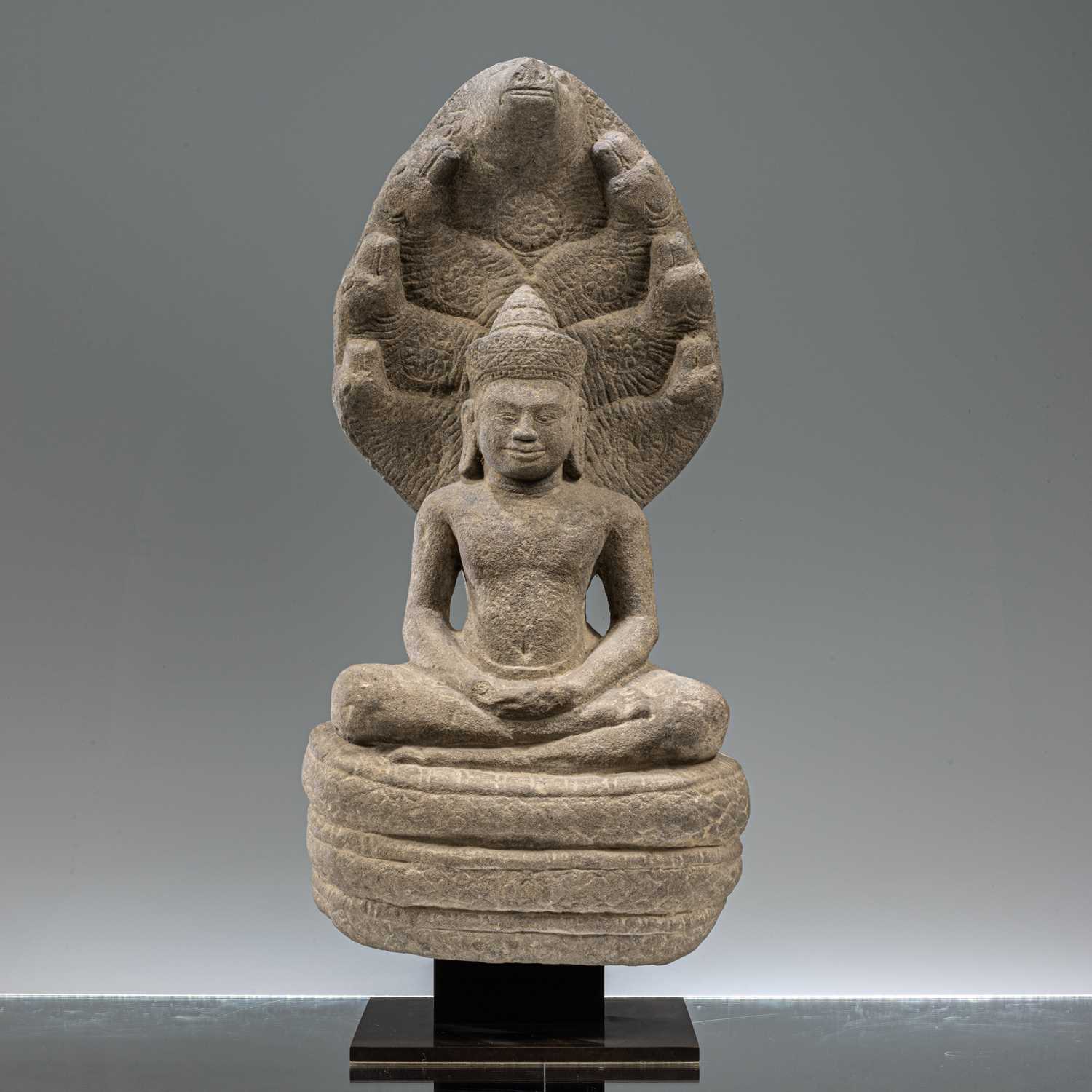 Lot 4 - SANDSTONE BUDDHA MUCHALINDA SOUTH-EAST ASIA 11TH CENTURY
