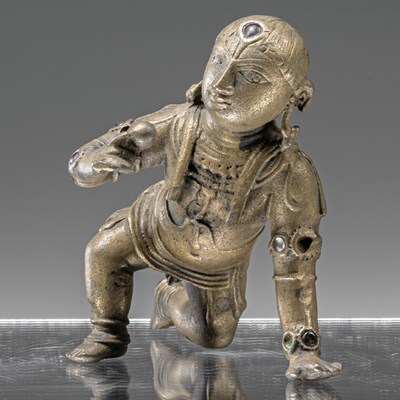 Lot 57 - BABY KRISHNA BRONZE WITH SILVER INLAYS INDIA 18TH CENTURY