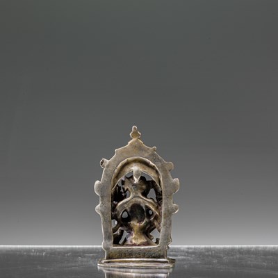Lot 7 - INDIAN 16TH CENTURY SEATED SILVER GANESHA INSCRIBED AT THE BACK