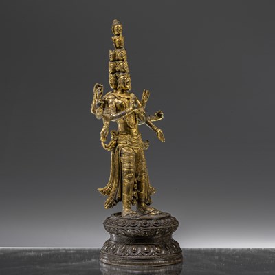 Lot 81 - STANDING FIREGILT BRONZE AVALOKITSHVARA TIBET 17TH CENTURY