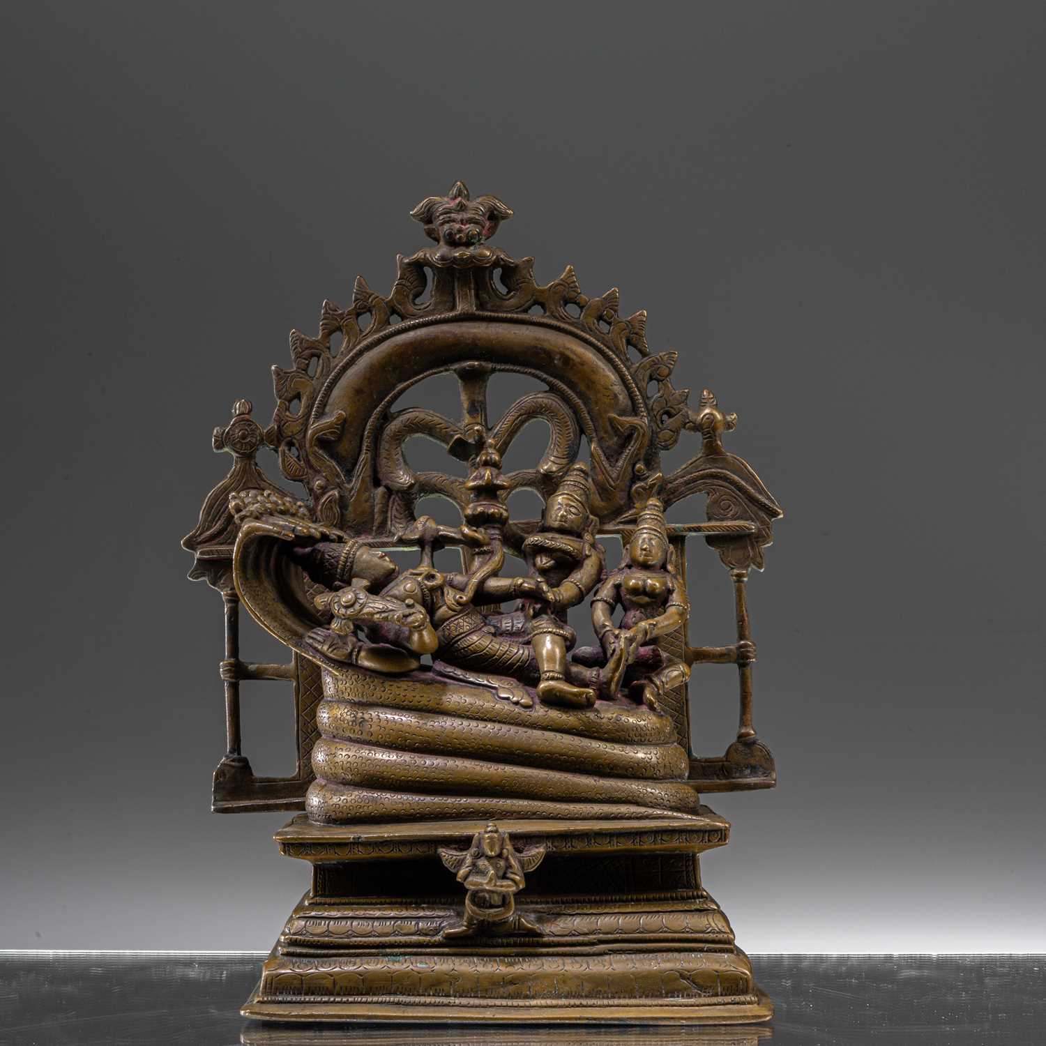 Lot 65 - INDIAN RECLINING BRONZE VISHNU 18TH CENTURY