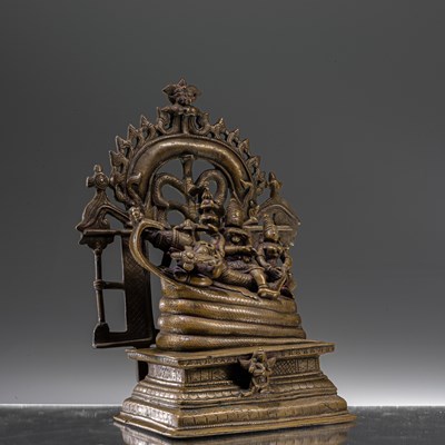 Lot 65 - INDIAN RECLINING BRONZE VISHNU 18TH CENTURY
