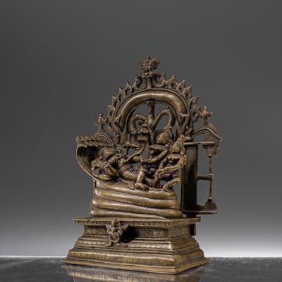 Lot 65 - INDIAN RECLINING BRONZE VISHNU 18TH CENTURY