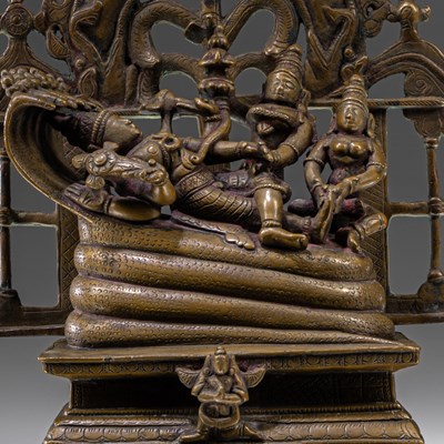 Lot 65 - INDIAN RECLINING BRONZE VISHNU 18TH CENTURY