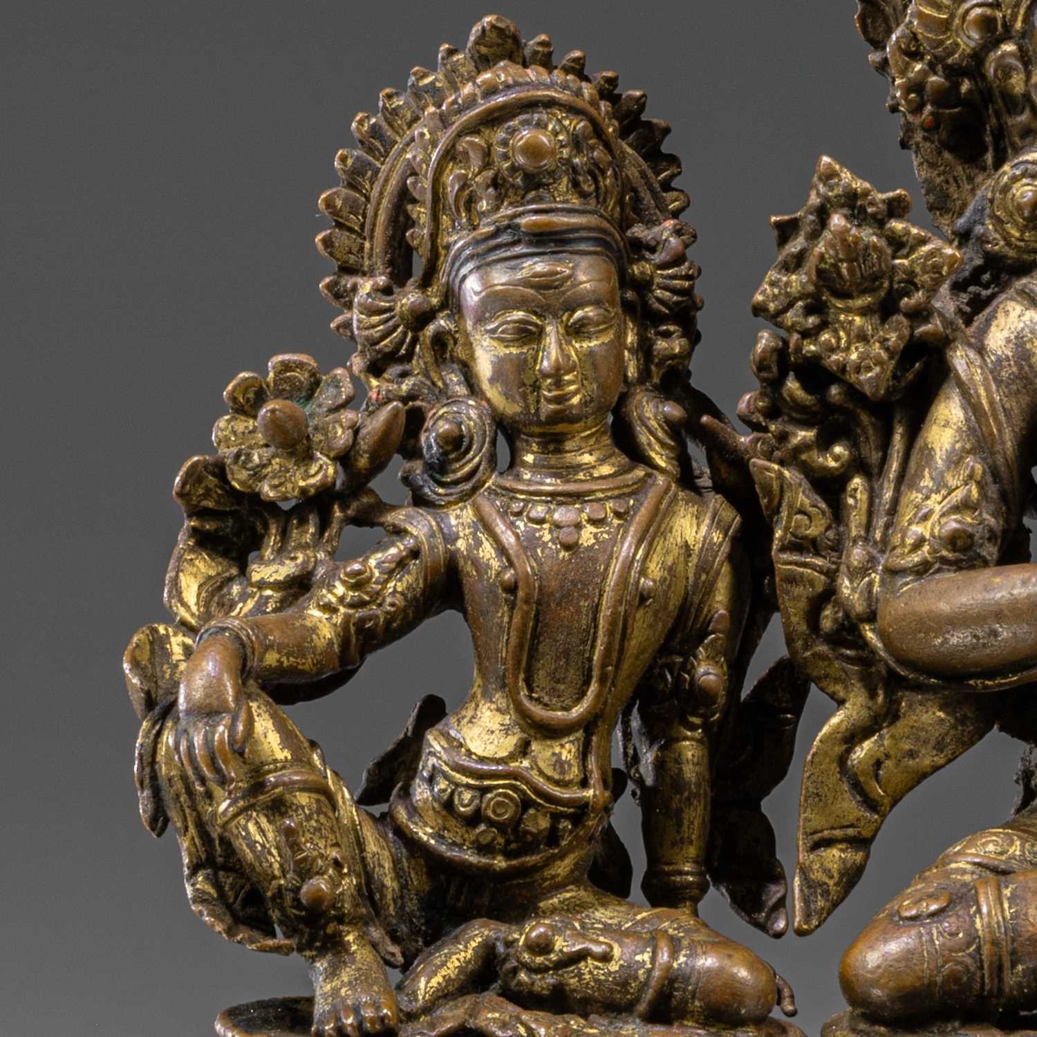 Lot 39 - GROUP OF THREE NEPALESE 16TH CENTURY BRONZE SCULPTURES (INDRA + CONSORTS)