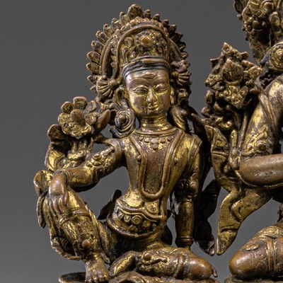 Lot 39 - GROUP OF THREE NEPALESE 16TH CENTURY BRONZE SCULPTURES (INDRA + CONSORTS)