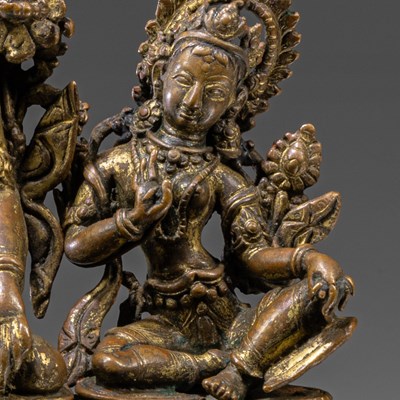 Lot 39 - GROUP OF THREE NEPALESE 16TH CENTURY BRONZE SCULPTURES (INDRA + CONSORTS)