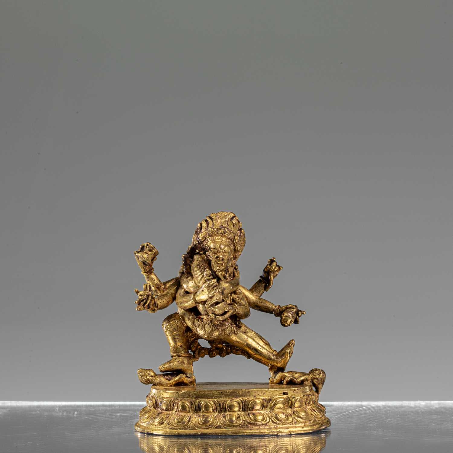 Lot 79 - GIL BRONZE NYINGSHUK MAHAKALA WITH SHAKTI NEPAL 18TH CENTURY
