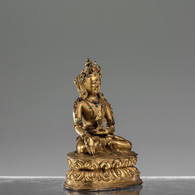 Lot 31 - MEDICINE BRONZE FIREGILT BUDDHA TIBET 16TH CENTURY