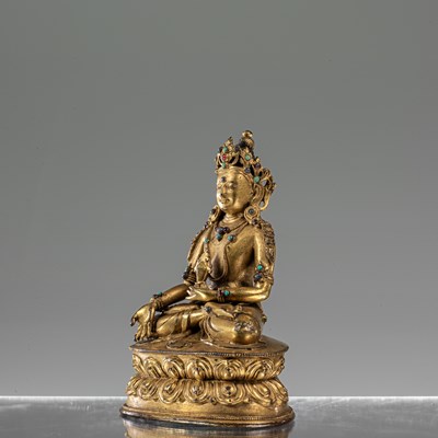 Lot 31 - MEDICINE BRONZE FIREGILT BUDDHA TIBET 16TH CENTURY