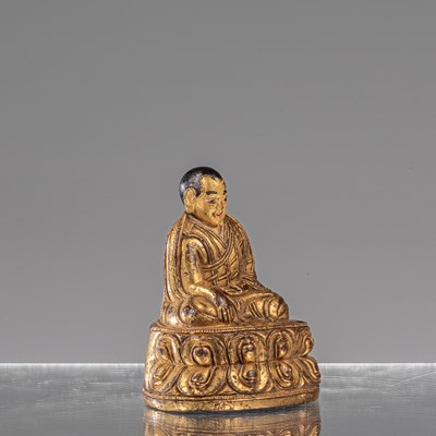 Lot 16 - SEATED BRONZE FIRGILT LAMA TIBET 18TH CENTURY