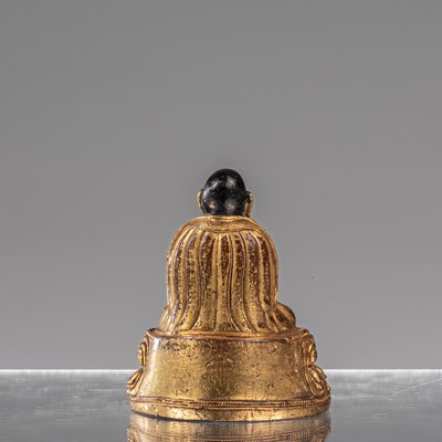 Lot 16 - SEATED BRONZE FIRGILT LAMA TIBET 18TH CENTURY