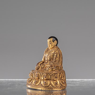 Lot 16 - SEATED BRONZE FIRGILT LAMA TIBET 18TH CENTURY