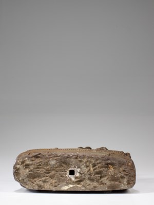 Lot 58 - LIME STONE SURYA WITH CONSORTS NEPAL 15TH CENTURY