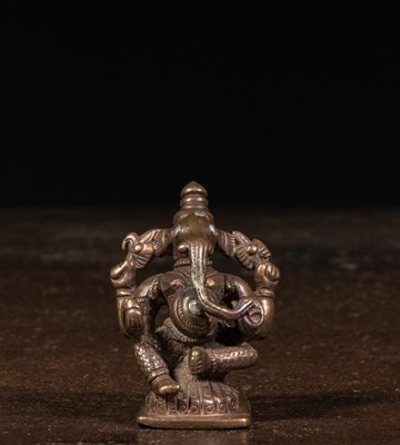 Lot 144 - SEATED GANESHA BRONZE INDIA 15TH CENTURY WITH SILVER