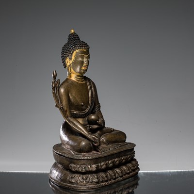 Lot 22 - SEATED MEDICINE BUDDHA BRONZE AND SILVER NEPAL 15TH CENTURY