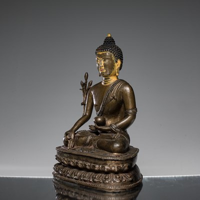Lot 22 - SEATED MEDICINE BUDDHA BRONZE AND SILVER NEPAL 15TH CENTURY