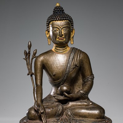 Lot 22 - SEATED MEDICINE BUDDHA BRONZE AND SILVER NEPAL 15TH CENTURY