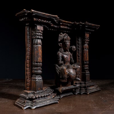 Lot 13 - KARTIKEYA OR KUMARA WITH PEACOCK WOOD 16TH CENTURY NEPAL NEWAR CULTURE IN TORANA