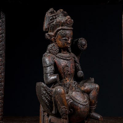 Lot 13 - KARTIKEYA OR KUMARA WITH PEACOCK WOOD 16TH CENTURY NEPAL NEWAR CULTURE IN TORANA
