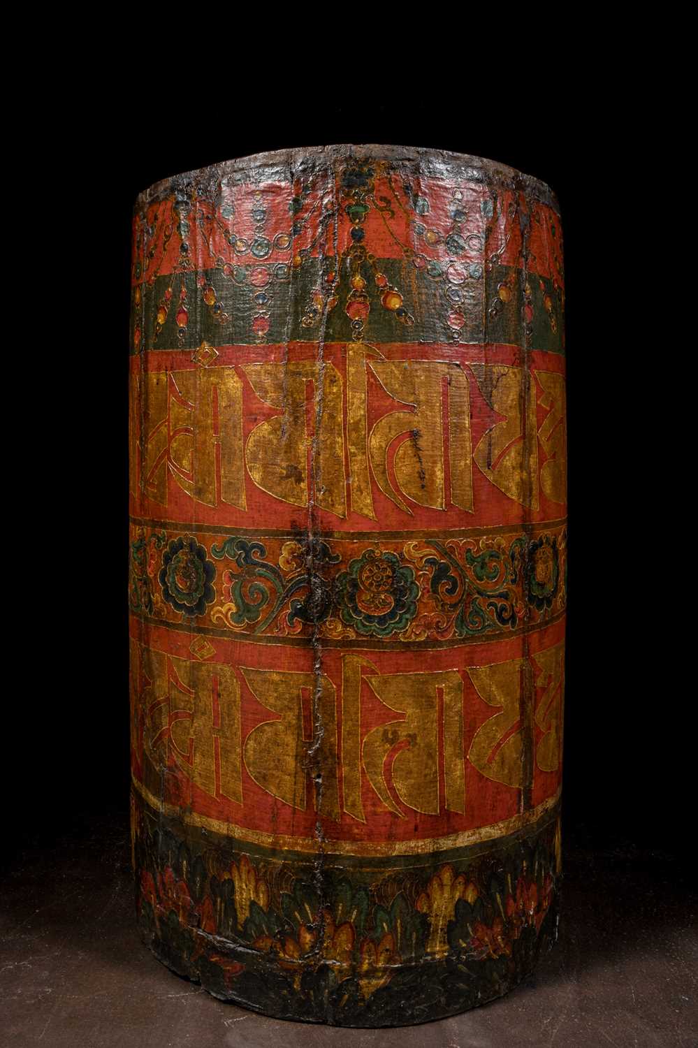 Lot 69 - LARGE TEMPLE PRAYER WHEEL TIBET WOOD WITH LEATHER PAINTED TIBET 18TH CENTURY