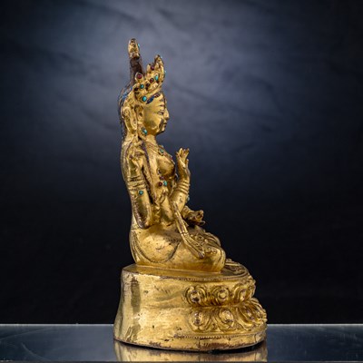Lot 52 - SEATED BRONZE GILT PRAJNAPARAMITA TIBET 15TH CENTURY