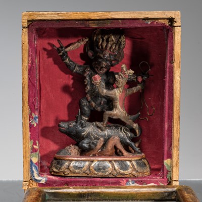 Lot 18 - WOOD GAU WITH YAMA TIBET OR MONGOLIA 19TH CENTURY