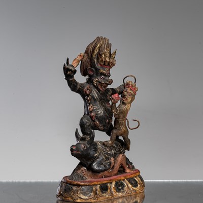 Lot 18 - WOOD GAU WITH YAMA TIBET OR MONGOLIA 19TH CENTURY