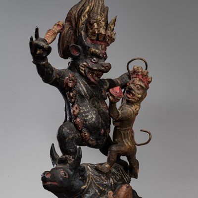 Lot 18 - WOOD GAU WITH YAMA TIBET OR MONGOLIA 19TH CENTURY