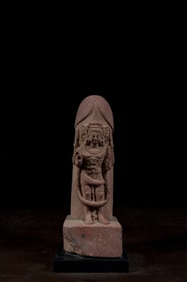 Lot 128 - SHIVA LINGAM WITH TRIMUKHA LINGAMS RED SANDSTONE HINDU SHAHI 8TH CENTURY