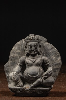 Lot 67 - SEATED STONE JAMBHALA NEPAL 18TH CENTURY