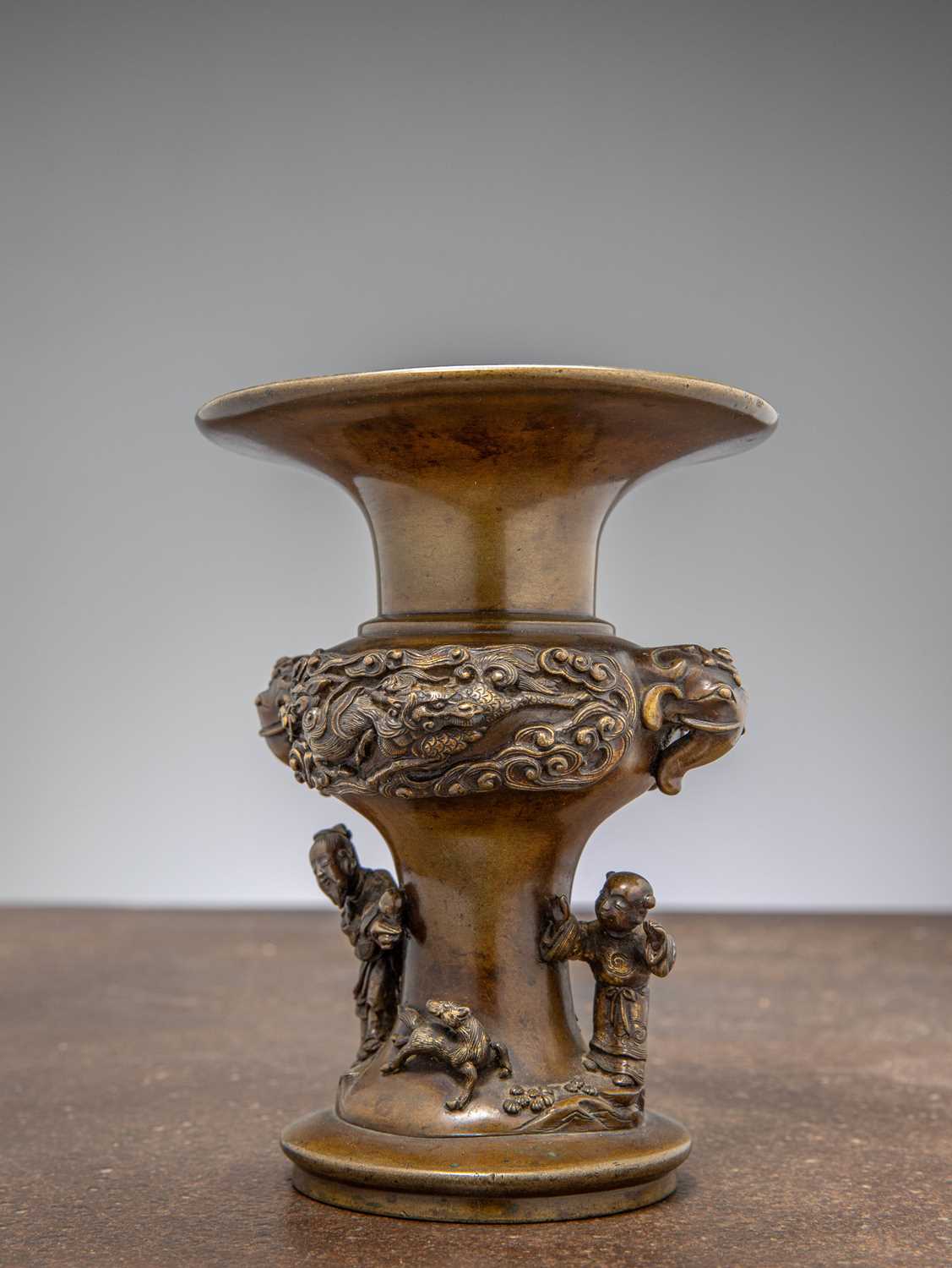Lot 8 - BRONZE 'BOYS AT PLAY' VASE WITH DRAGON RELIEF AND SEAL MARK , CHINA QING DYNASTY