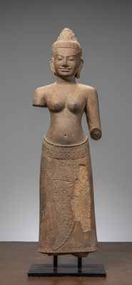 Lot 94 - STANDING SANDSTONE FIGURE OF UMA LATE 12TH TO 13TH CENTURY BAYON