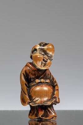 Lot 232 - CARVED NETSUKE DEPICTING A LAUGHING BOY