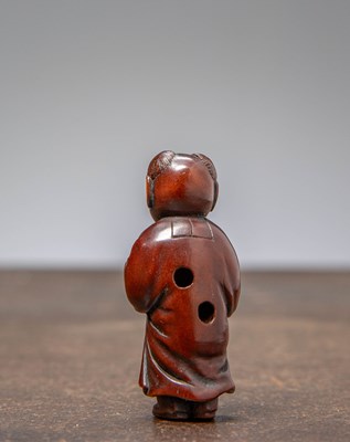 Lot 34 - (R) NETSUKE OF A BOY HOLDING A TORTOISE