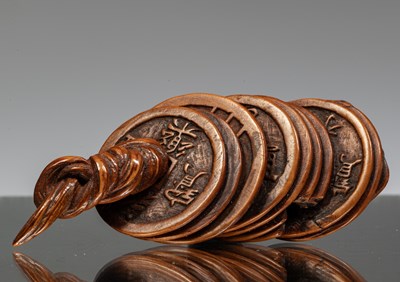 Lot 246 - NETSUKE OF A STRING OF CASH COINS
