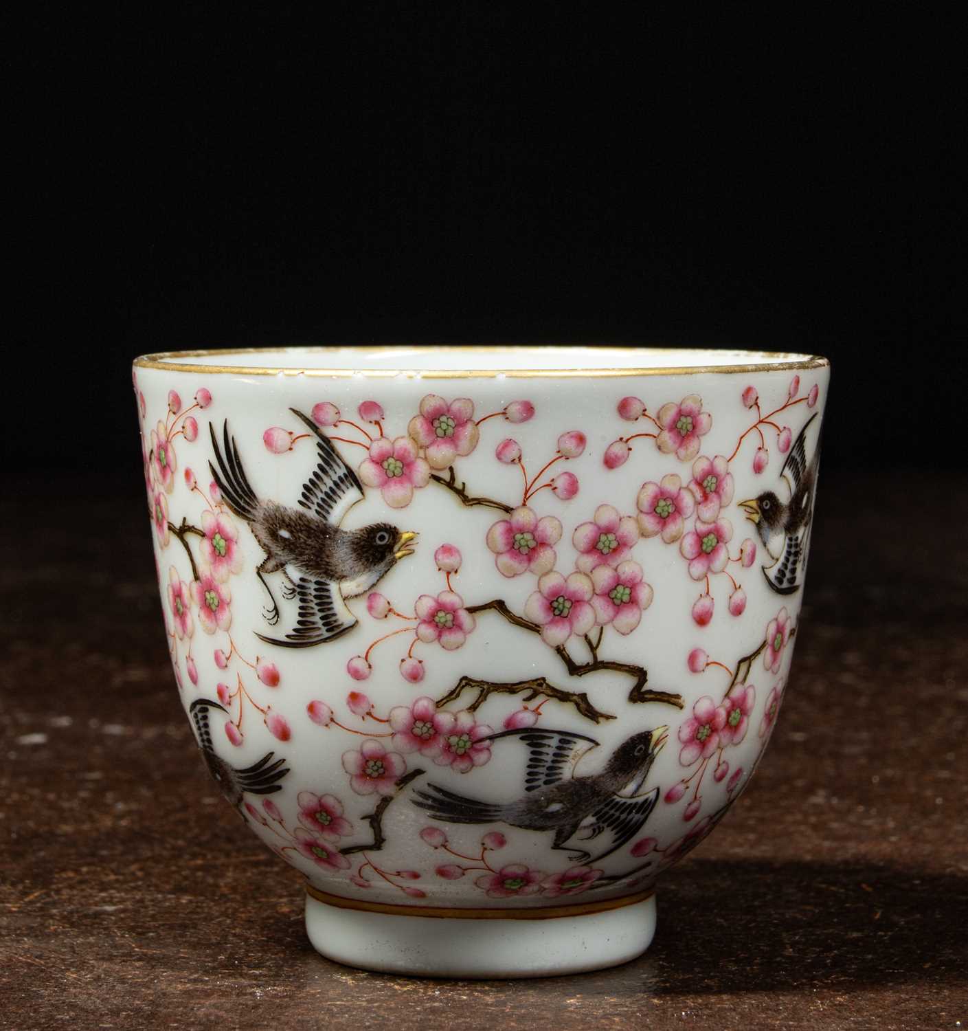Lot 95 - (R) FAMILIE-ROSE PORCELAIN CUP WITH PLUM BLOSSOMS, QING DYNASTY