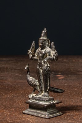 Lot 72 - A BRONZE FIGURE OF KARTIKEYA (SKANDA) WITH HIS VEHICLE PEACOCK NEPAL 19TH CENTURY