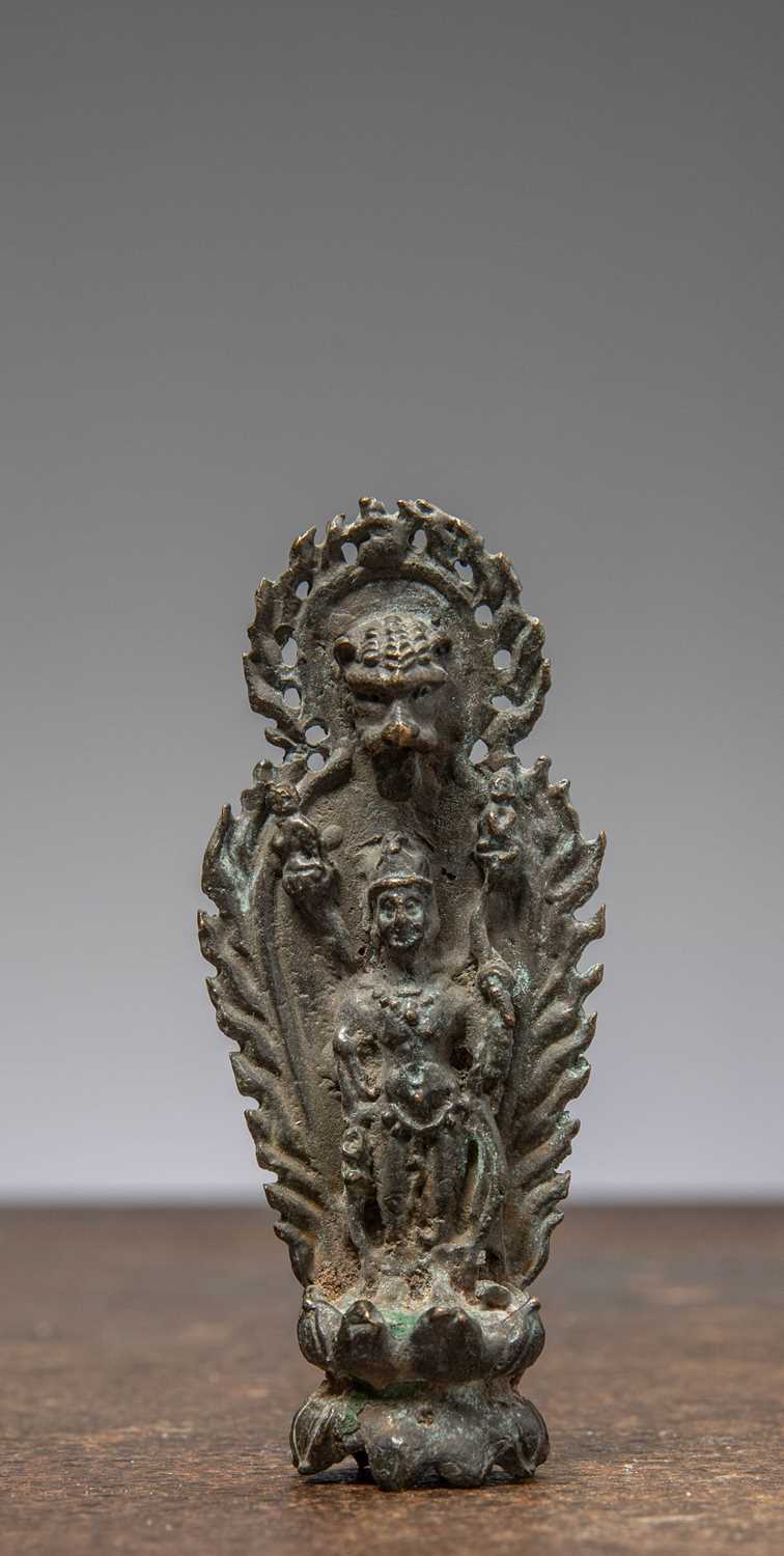 Lot 72 - A SMALL BRONZE FIGURE OF A GUARDIAN DEITY, CHINA MNG DYNASTY