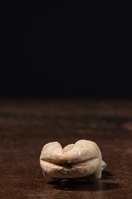 Lot 27 - A HONGSHAN JADE FIGURE, NORTHEAST CHINA CIRCA 3500–3000 BCE